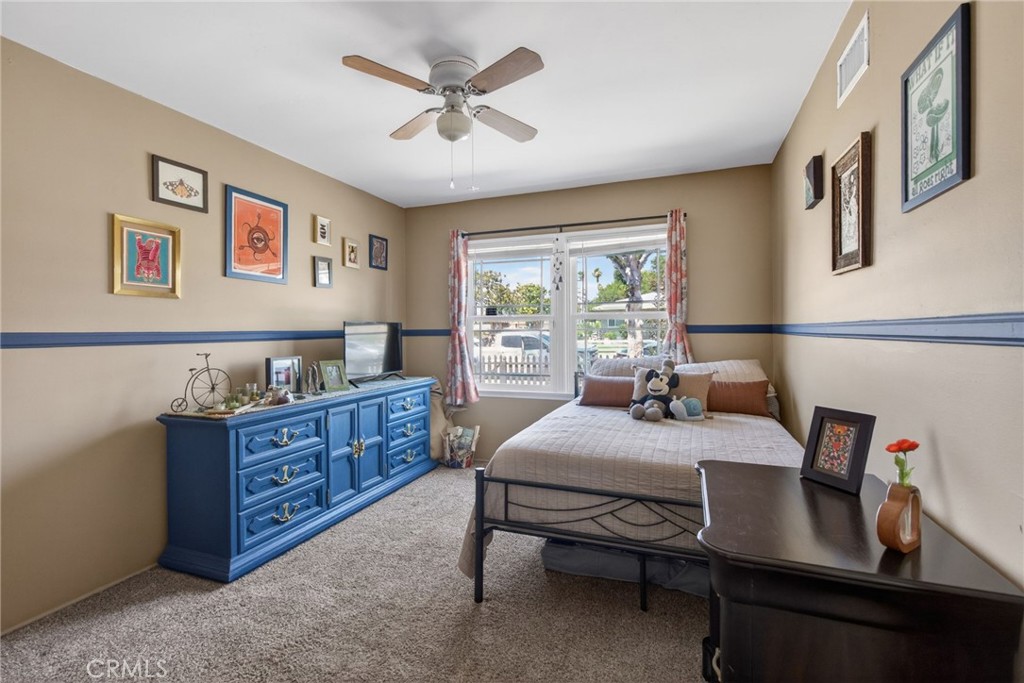 4194 Euclid Court Riverside, CA 92504 - Photo 18 of 29 Bedroom #2 with carpeting and ceiling fan.