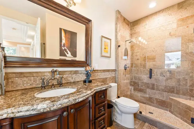 a spacious bedroom with bed and a large window