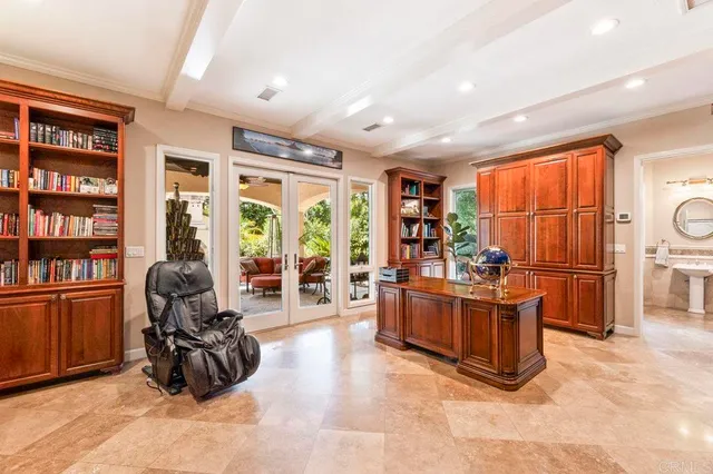 a spacious bathroom with a large tub a large window and a shower