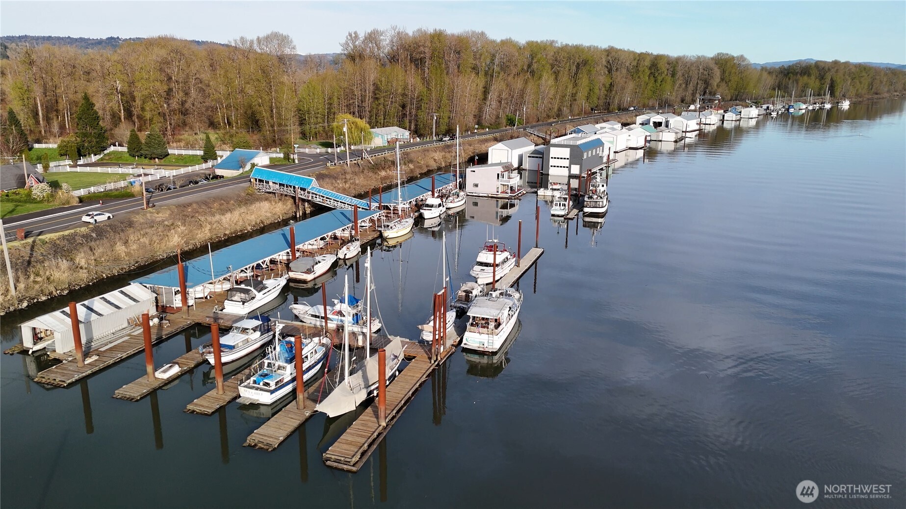 151 Barlow Point Road Longview, WA 98632 - Photo 22 of 34 a view of a lake with a mountain