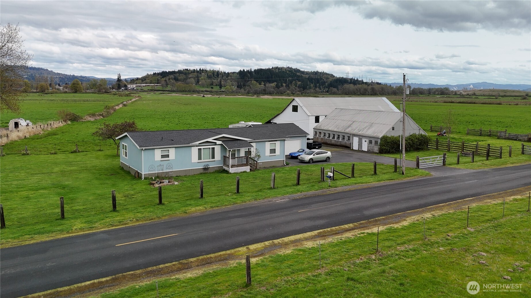 151 Barlow Point Road Longview, WA 98632 - Photo 9 of 34 a view of a house with a big yard