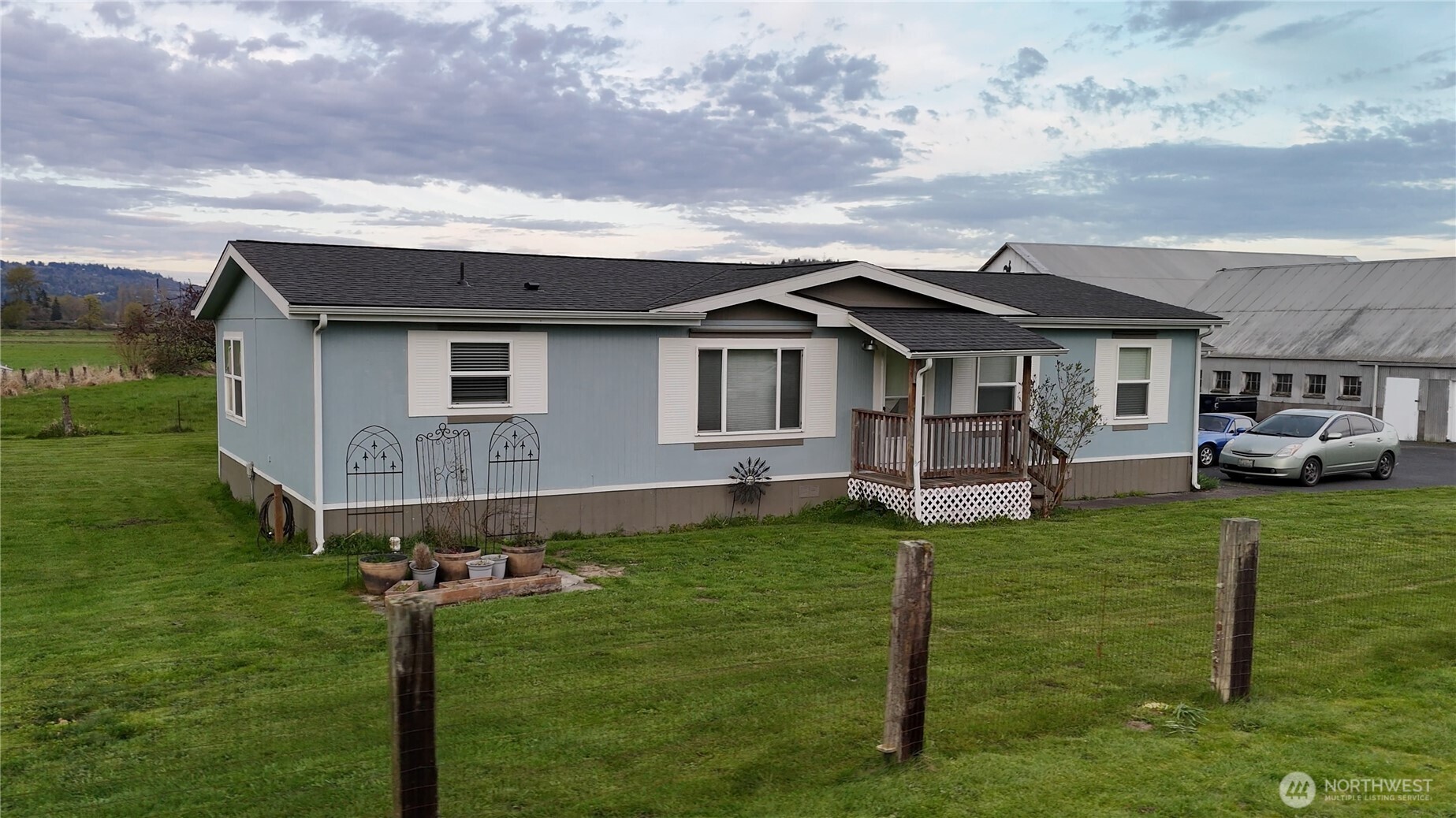 151 Barlow Point Road Longview, WA 98632 - Photo 10 of 34 a front view of a house with a garden