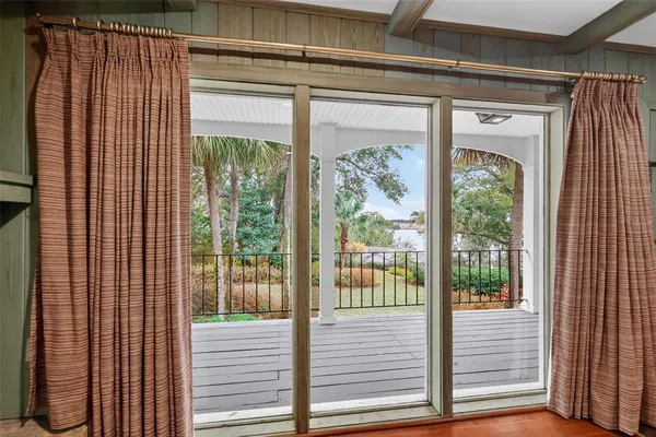 a bathroom with a toilet a sink and a mirror