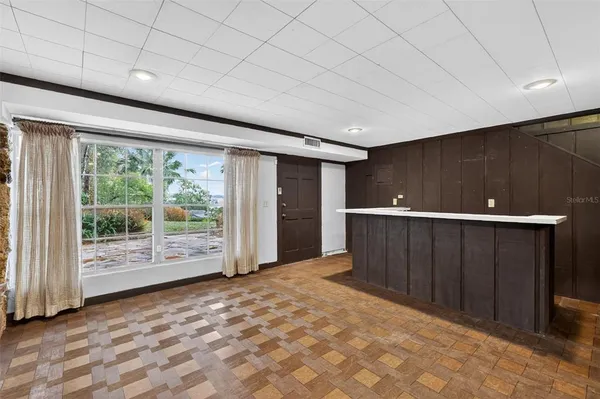 a view of a lake with a yard