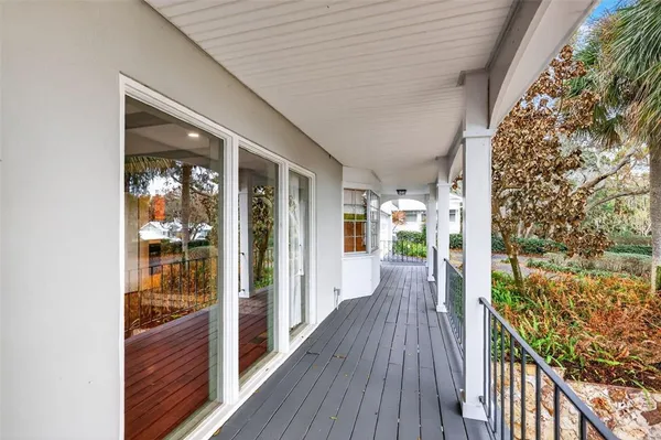 an aerial view of multiple house with a lake view