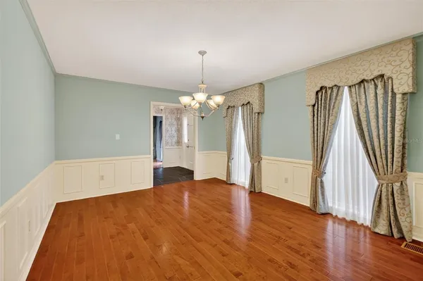 a kitchen with granite countertop cabinets stainless steel appliances and a sink