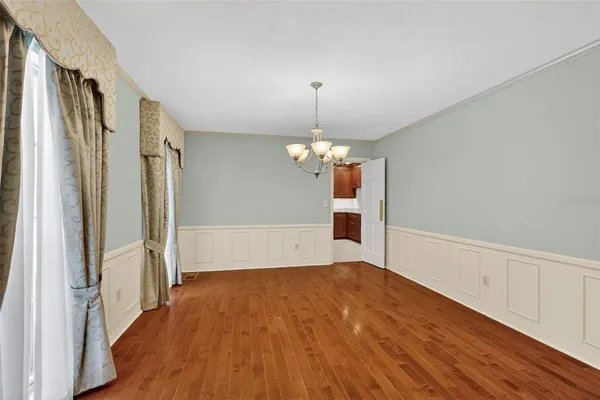 a kitchen with stainless steel appliances granite countertop a stove microwave and refrigerator