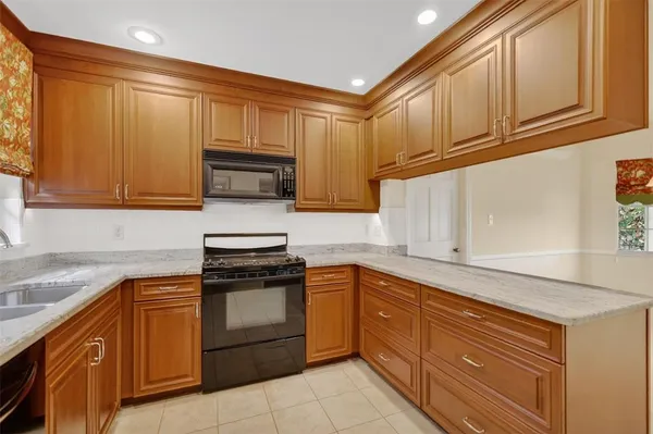 an empty room with windows and outdoor view