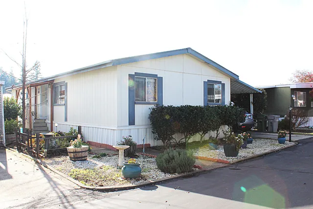 a view of a house with sitting area and furniture