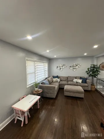 a kitchen with a table and chairs in it