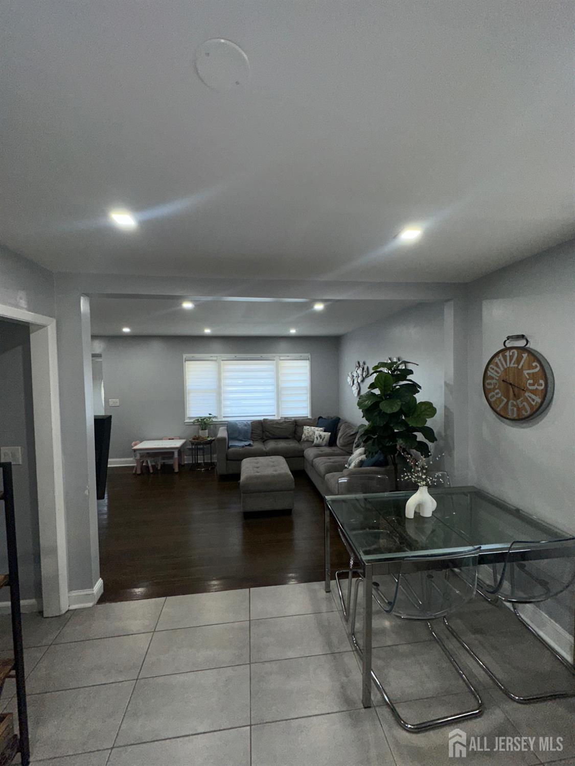 1019 Main Street Fords, NJ 08863 - Photo 7 of 20 a kitchen with a table and chairs in it