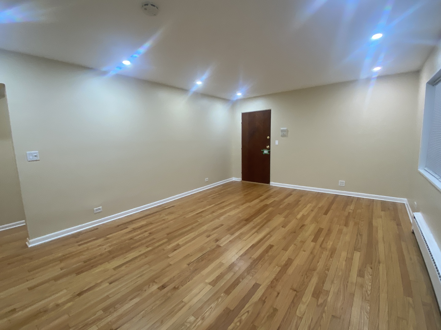 501 Sheridan Road, Unit A1 Evanston, IL 60202 - Photo 13 of 30 a view of room with wooden floor