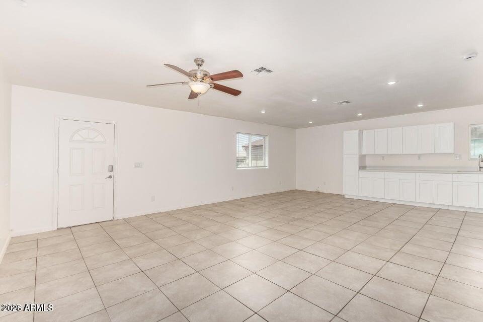 2828 East Chipman Road Phoenix, AZ 85040 - Photo 4 of 26 a view of empty room with window