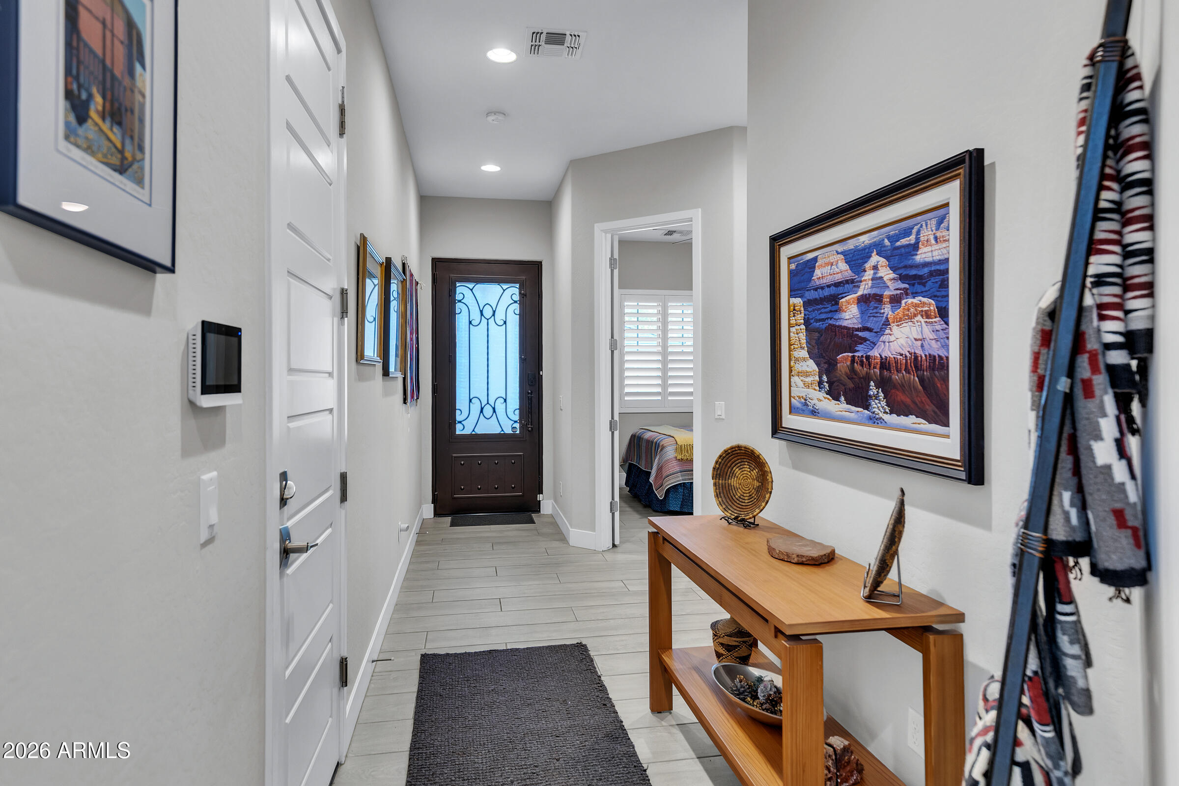 622 West Deer Creek Road Phoenix, AZ 85048 - Photo 5 of 39 a view of a hallway with windows and closet