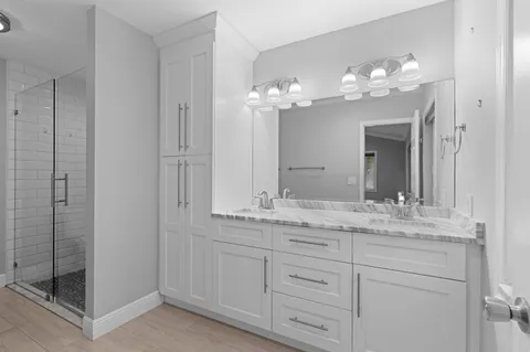 a bathroom with a sink and a mirror