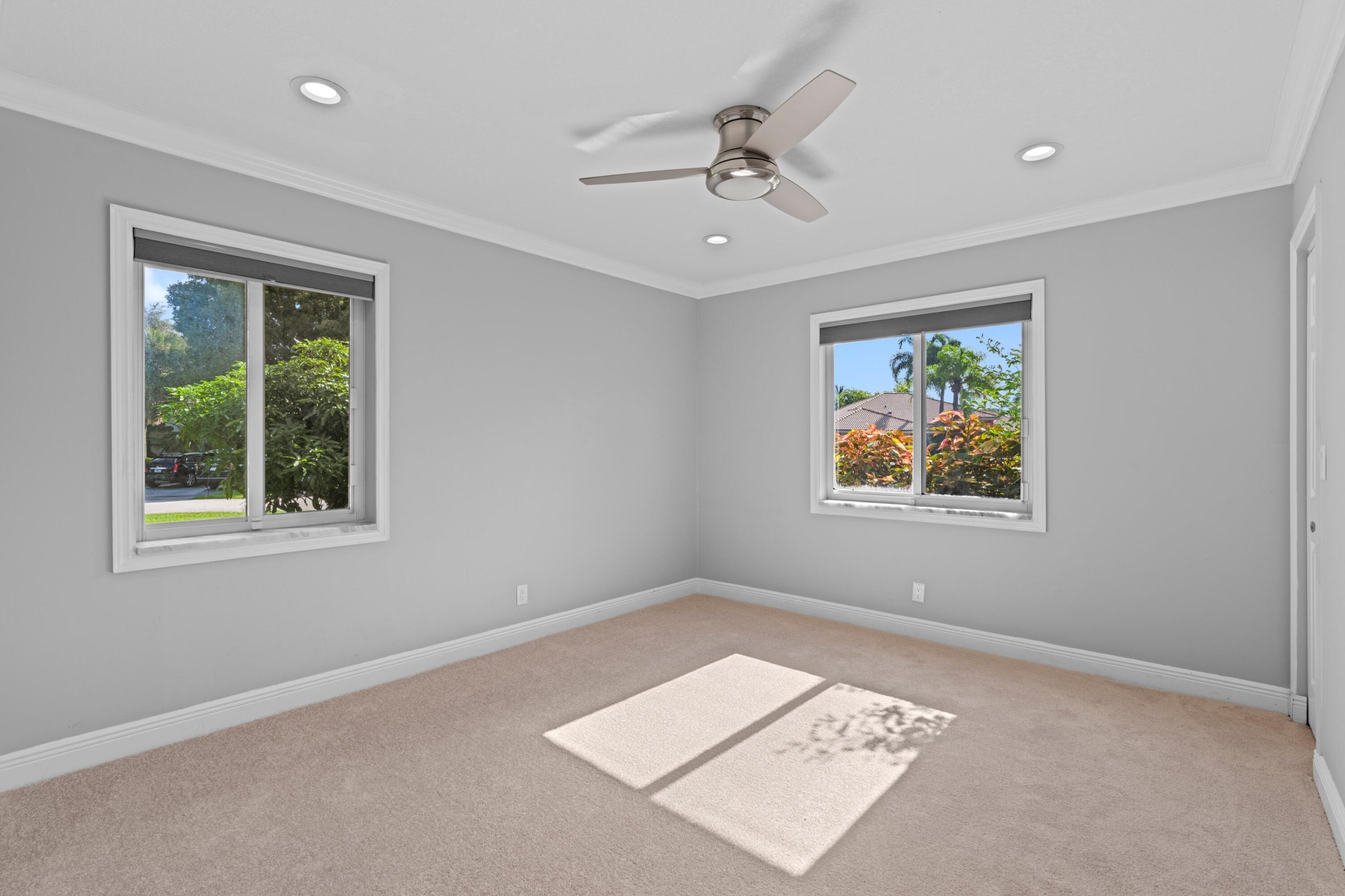 1431 Rudder Cove Wellington, FL 33414 - Photo 14 of 22 a view of an empty room with a window