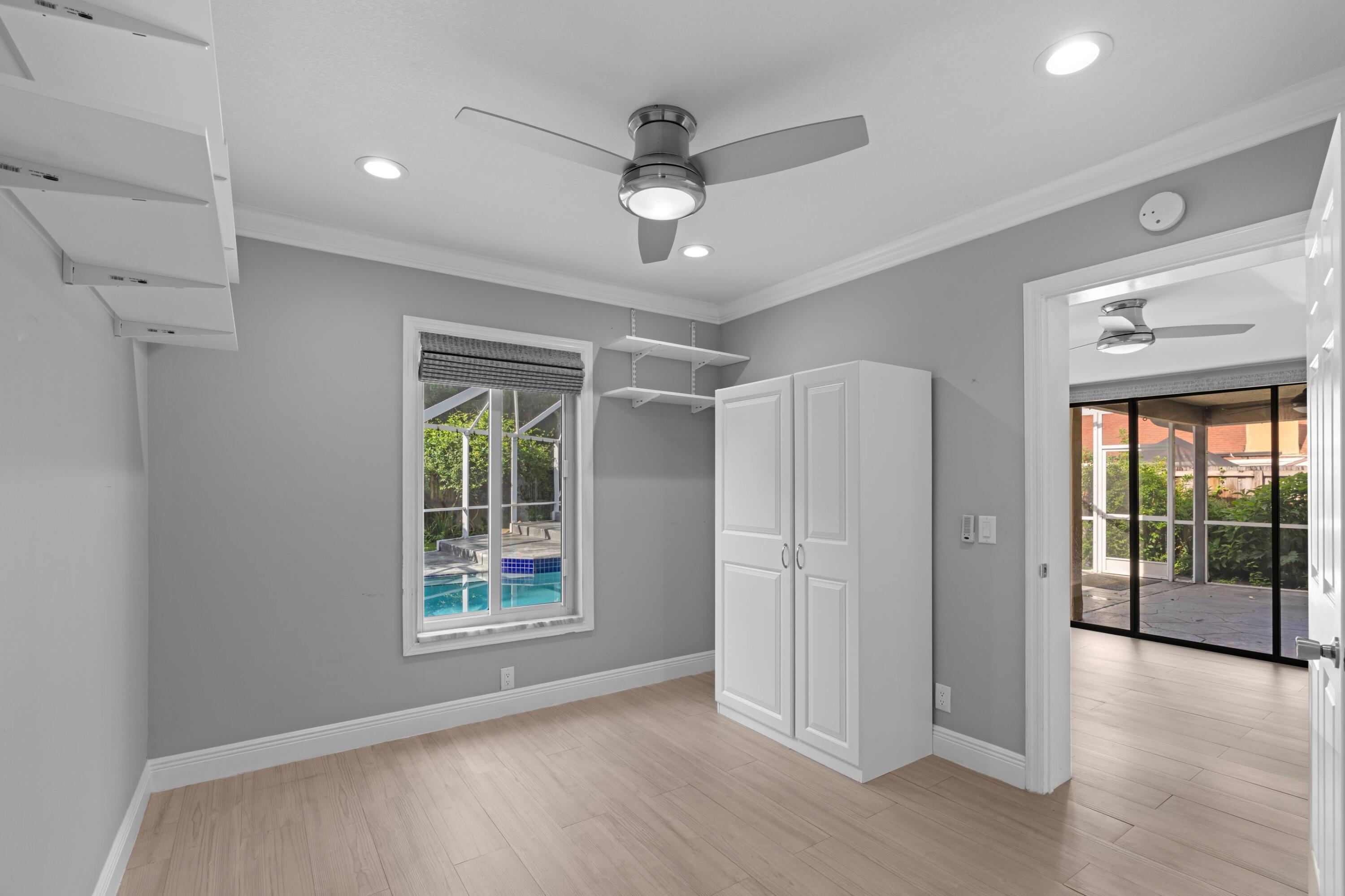 1431 Rudder Cove Wellington, FL 33414 - Photo 17 of 22 a view of an empty room with a window