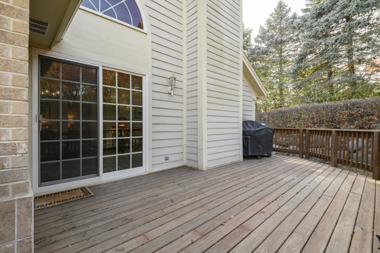675 Charleston Court, Unit B Brookfield, WI 53045 - Photo 49 of 55 Large Cedar toned treated wood deck