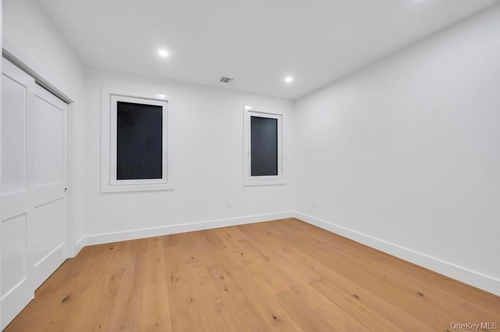 472 Farm Ranch Road East Bethpage, NY 11714 - Photo 15 of 26 wooden floor in an empty room