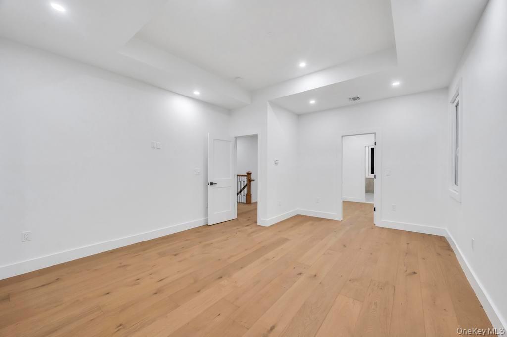 472 Farm Ranch Road East Bethpage, NY 11714 - Photo 19 of 26 a view of empty room with wooden floor