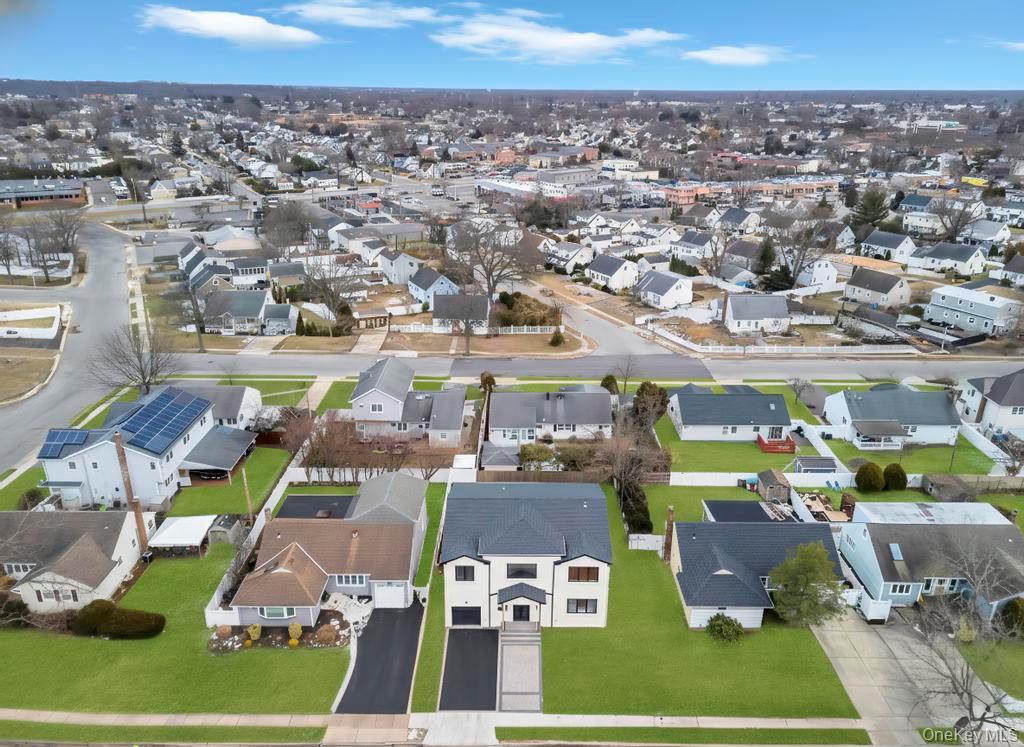 472 Farm Ranch Road East Bethpage, NY 11714 - Photo 2 of 26 an aerial view of a city