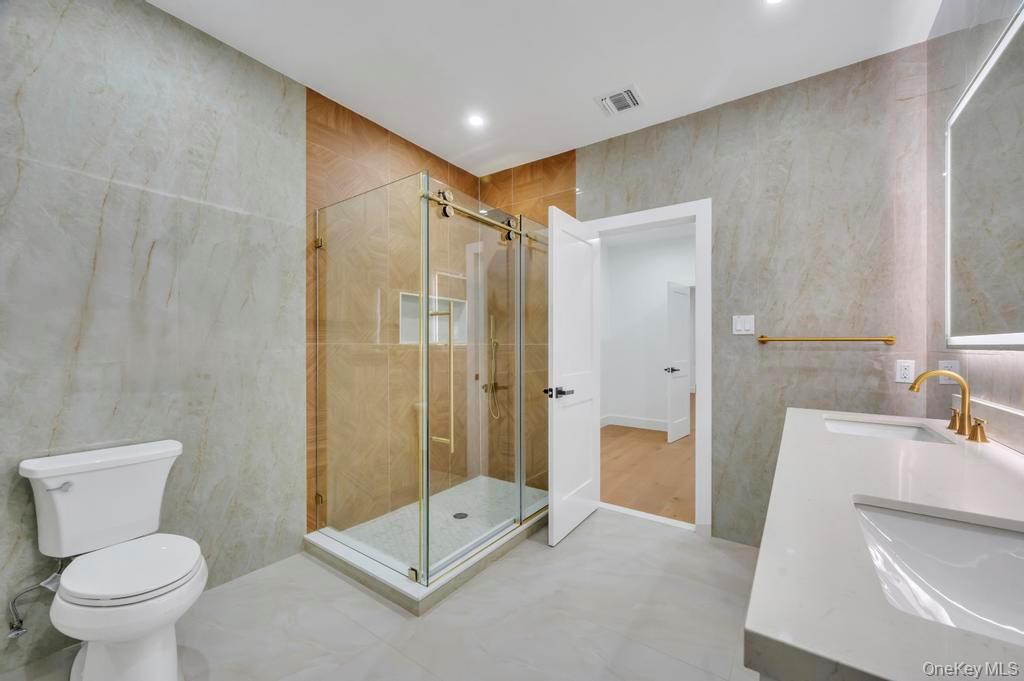 472 Farm Ranch Road East Bethpage, NY 11714 - Photo 25 of 26 a bathroom with a shower and a toilet