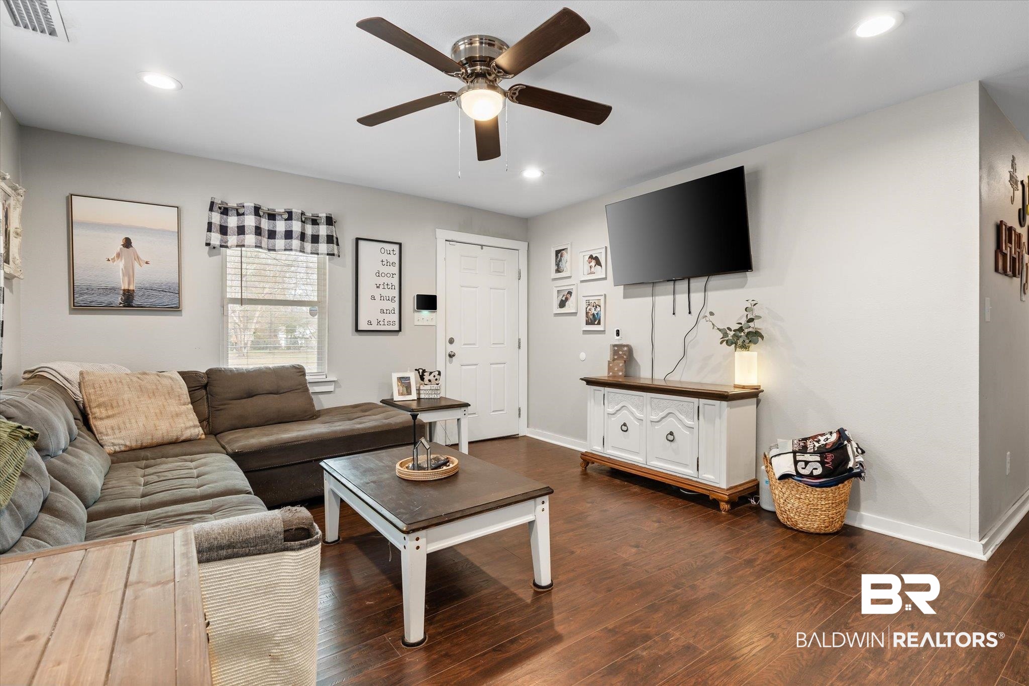 419 Pierce Street Saraland, AL 36571 - Photo 3 of 21 Living room with dark hardwood / wood-style floors and ceiling fan