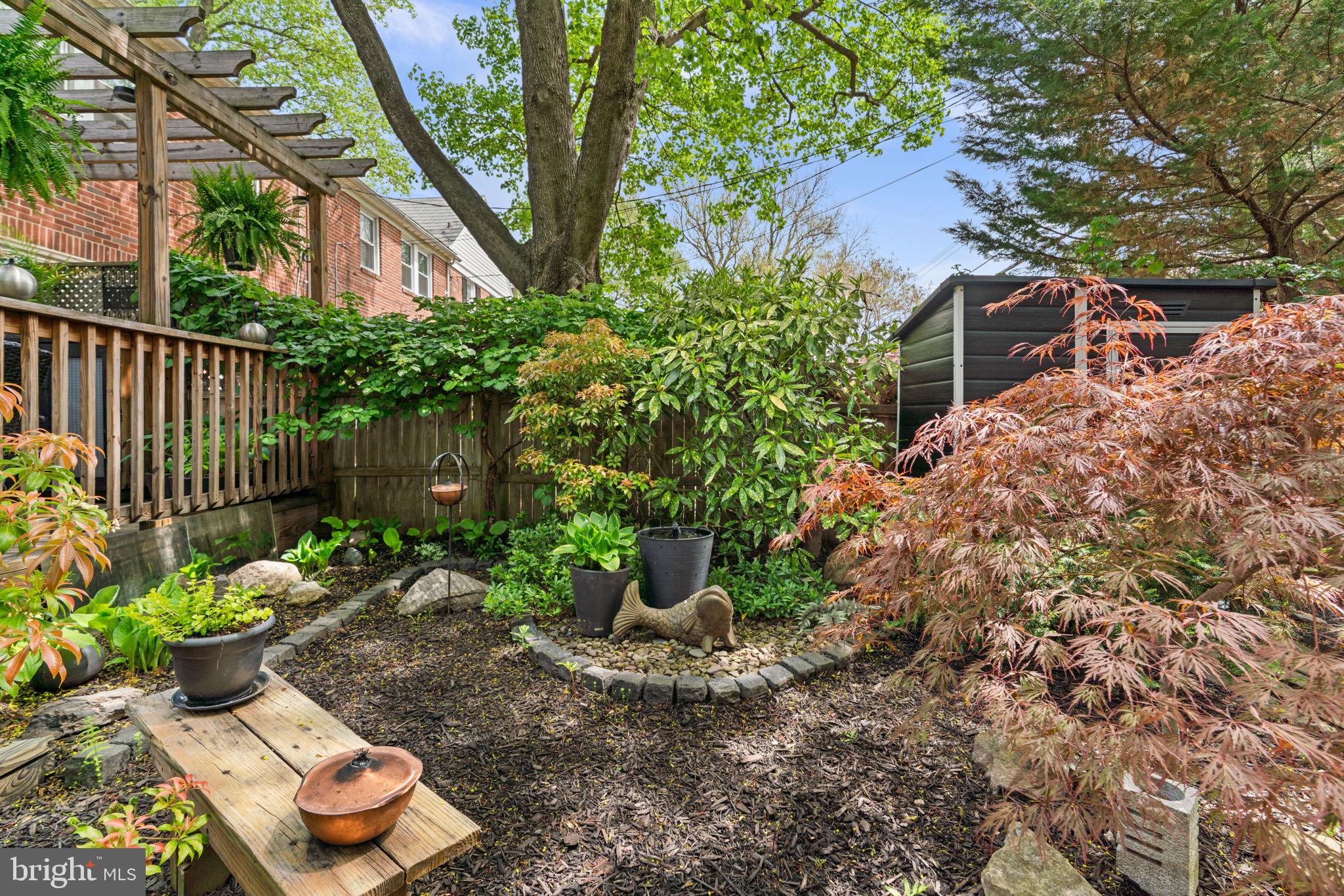 79 Murdock Road Baltimore, MD 21212 - Photo 26 of 38 Serene garden retreat in full bloom.