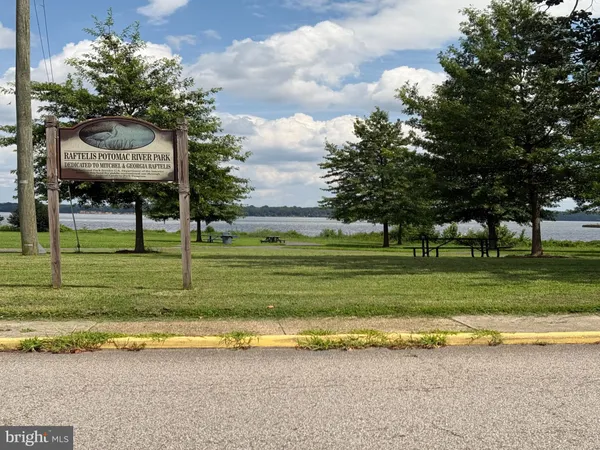 a view of a yard with swimming pool