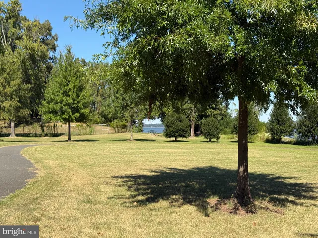 a view of swimming pool with an outdoor space and seating area