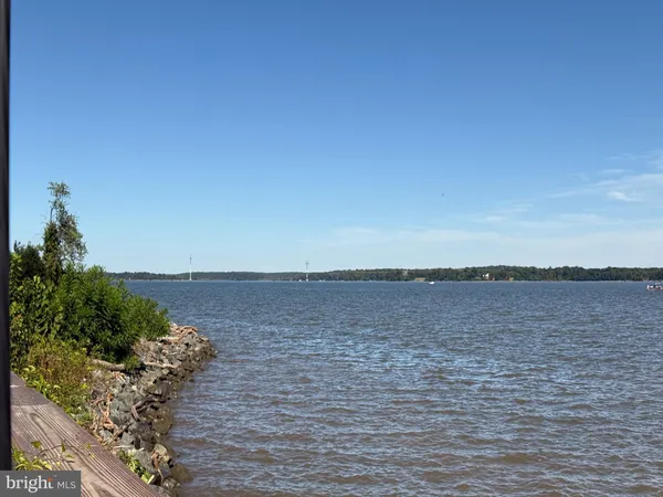 a view of a park with iron fence