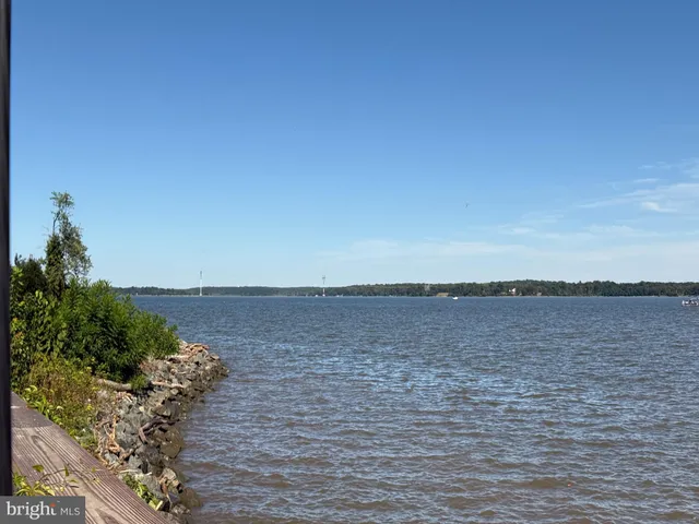 a view of a park with iron fence