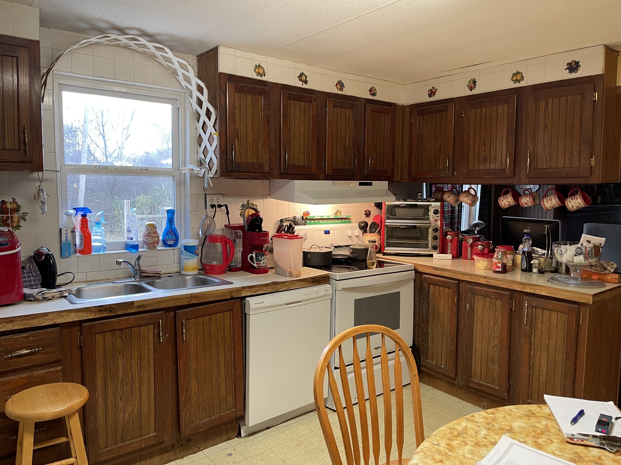4426 William Woodard Road Springfield, TN 37172 - Photo 7 of 17 a kitchen with a sink cabinets and window