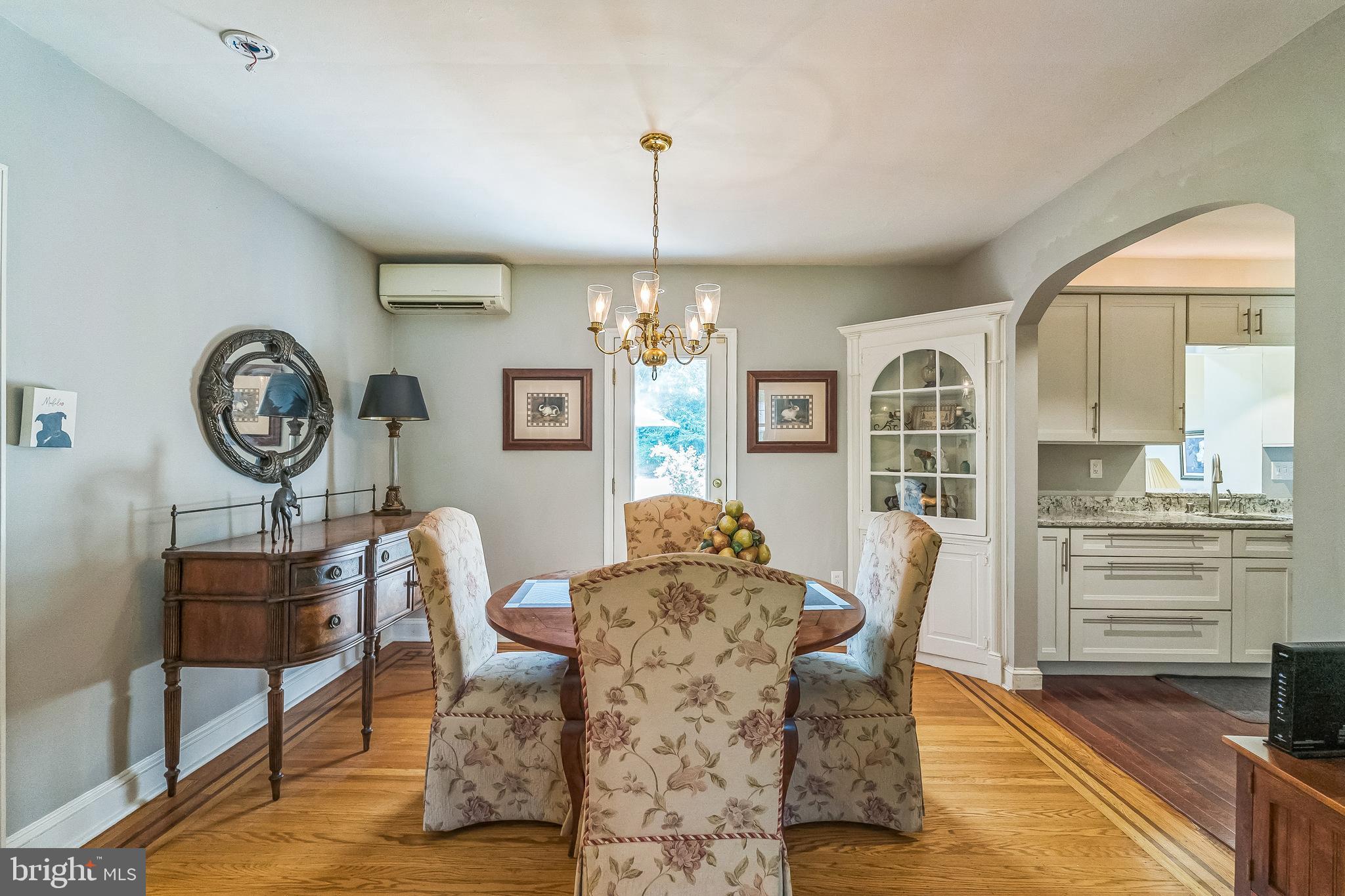 31 Rabbit Run Road Rose Valley, PA 19086 - Photo 11 of 35 a view of a dining room with furniture and a chandelier