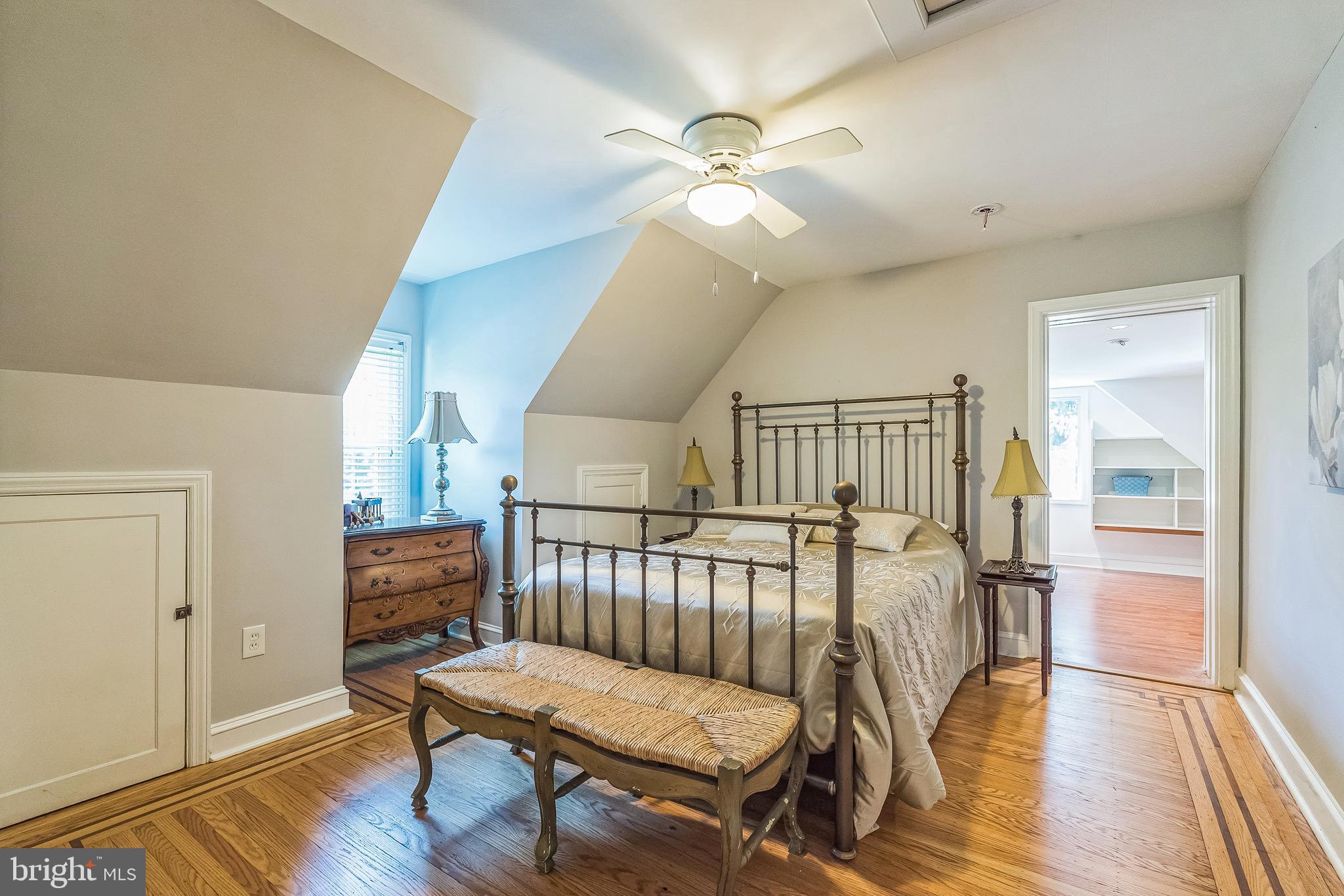 31 Rabbit Run Road Rose Valley, PA 19086 - Photo 21 of 35 a bedroom with furniture and wooden floor