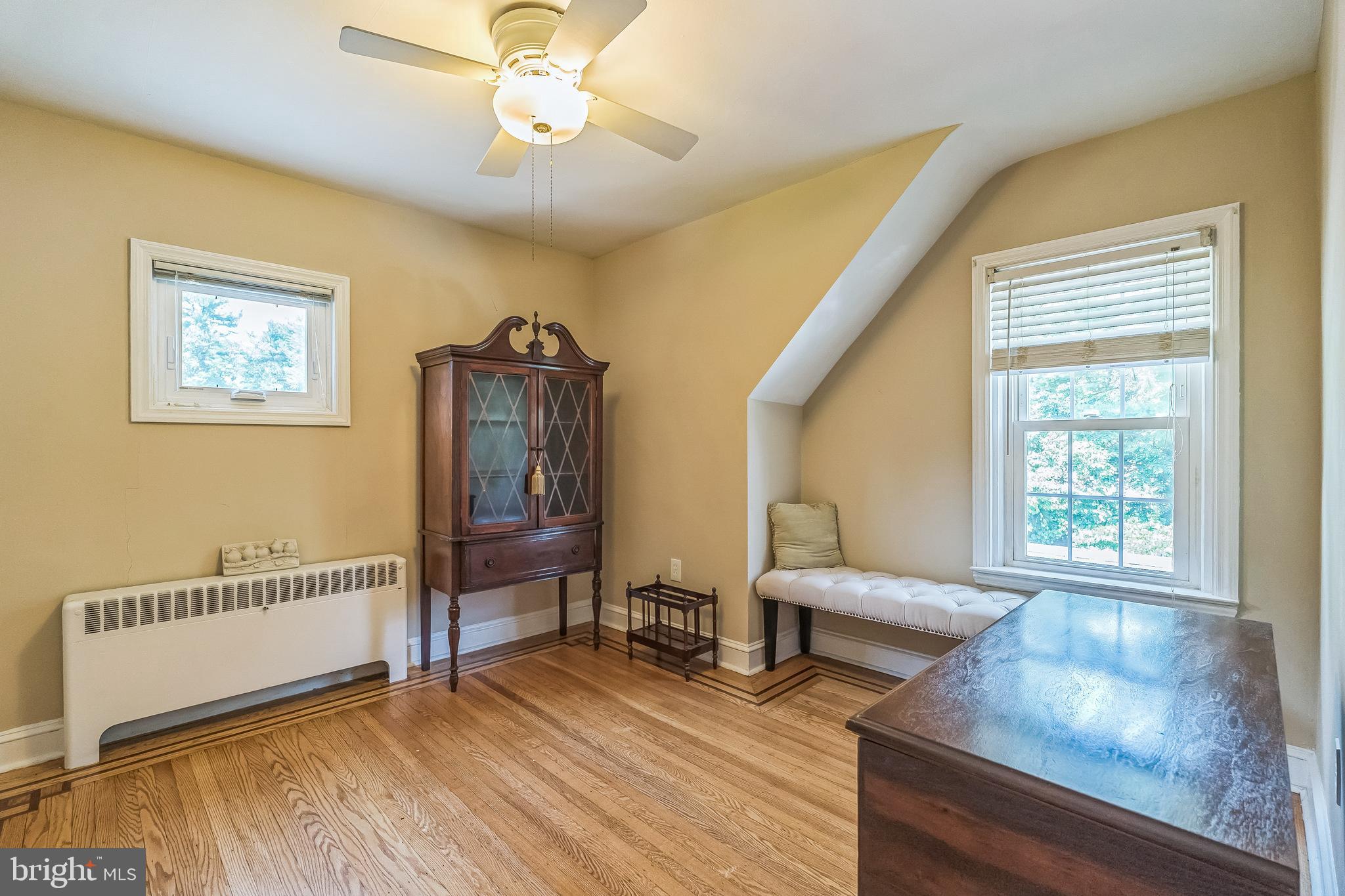 31 Rabbit Run Road Rose Valley, PA 19086 - Photo 25 of 35 a living room with furniture and a window