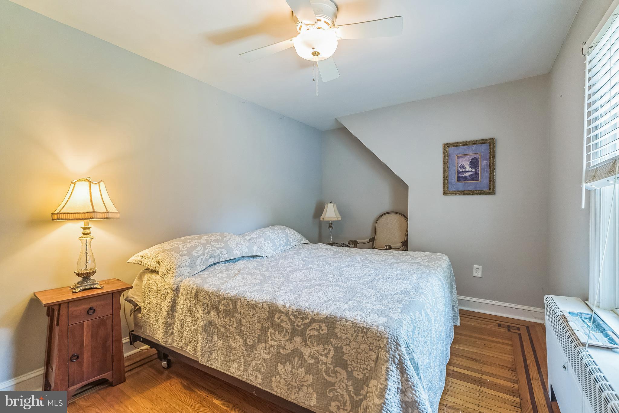 31 Rabbit Run Road Rose Valley, PA 19086 - Photo 27 of 35 a bedroom with bed and window
