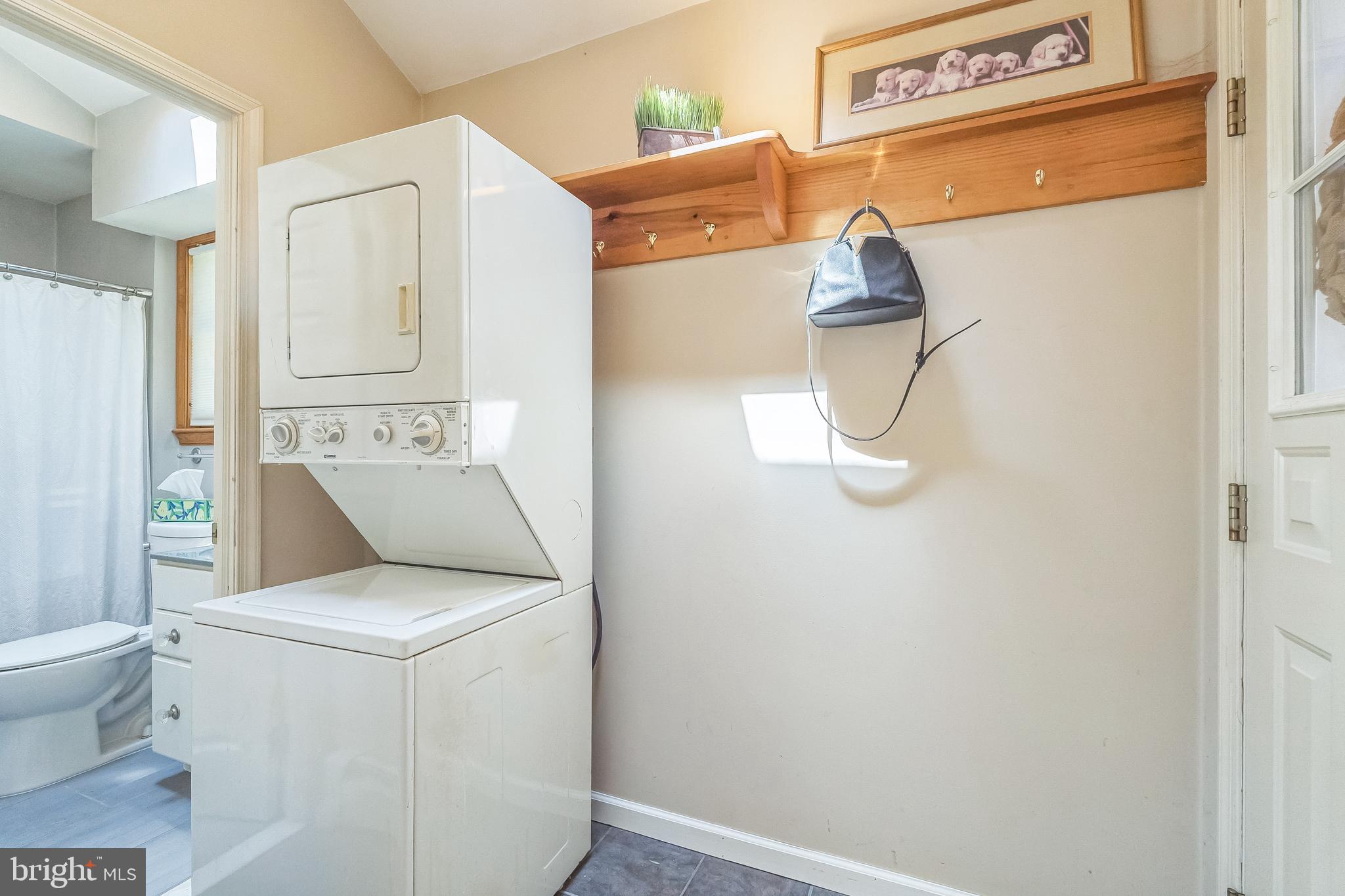 31 Rabbit Run Road Rose Valley, PA 19086 - Photo 30 of 35 a utility room with dryer and washer