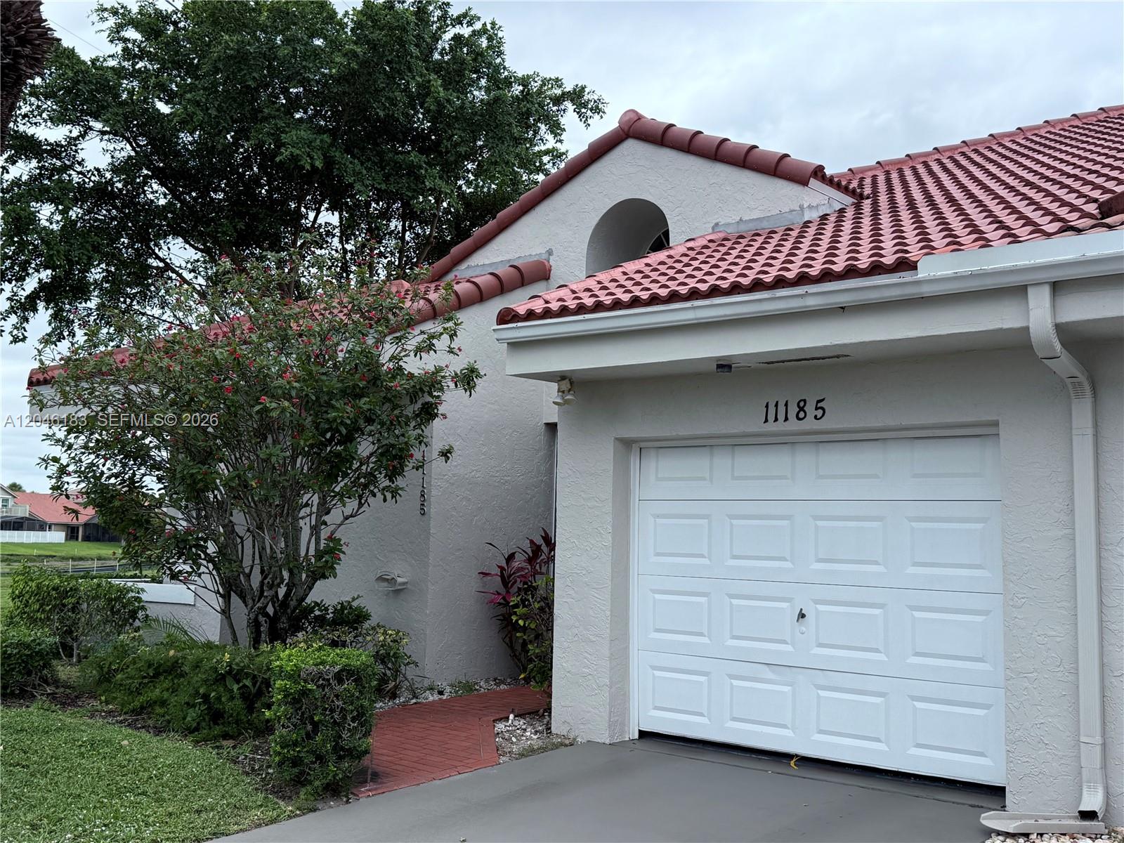 11185 Rios Road Boca Raton, FL 33498 - Photo 1 of 14