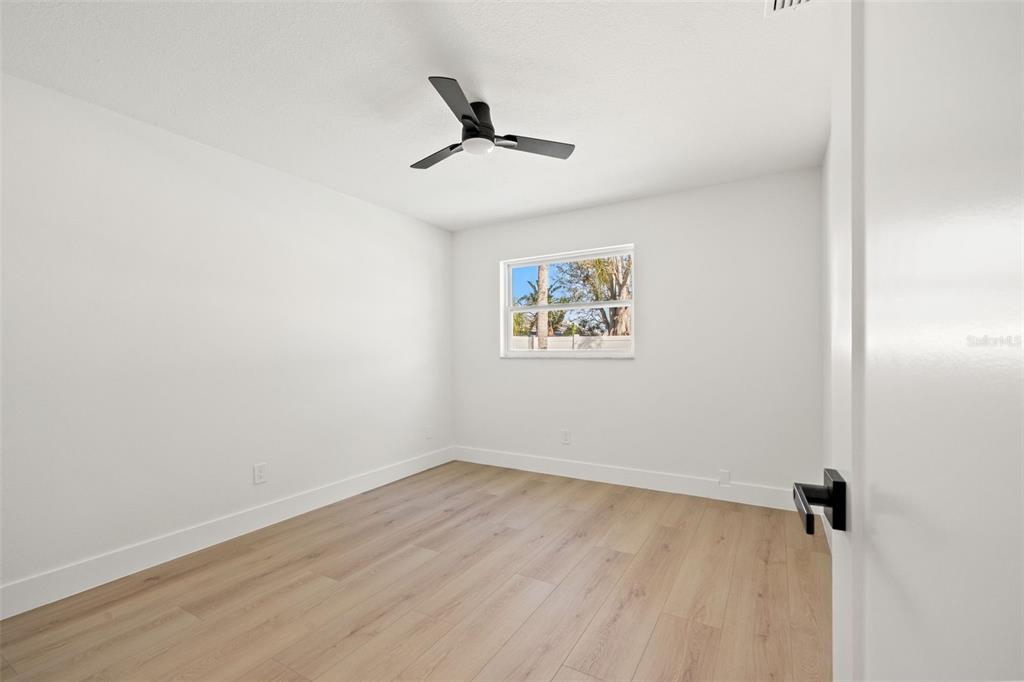 12671 115th Street Largo, FL 33778 - Photo 29 of 39 an empty room with a window