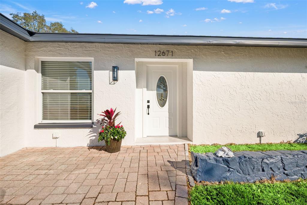 12671 115th Street Largo, FL 33778 - Photo 39 of 39 a front view of a house with a window
