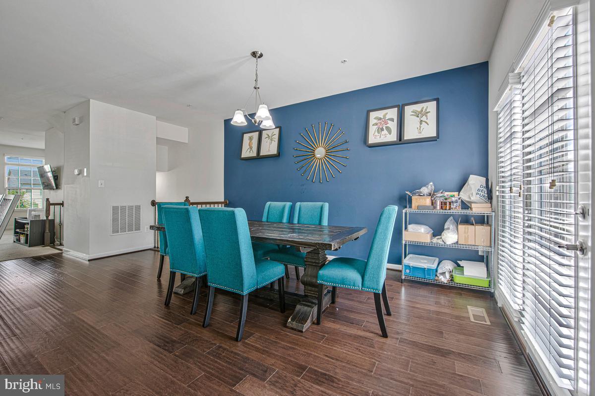 14413 Sandy Ridge Lane Laurel, MD 20707 - Photo 12 of 41 Vibrant dining space with modern flair.