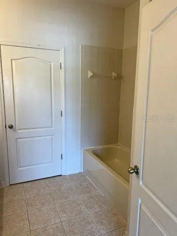 a bathroom with a bathtub