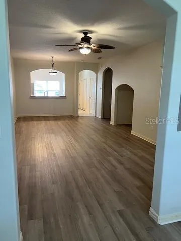 a view of a livingroom with wooden floor