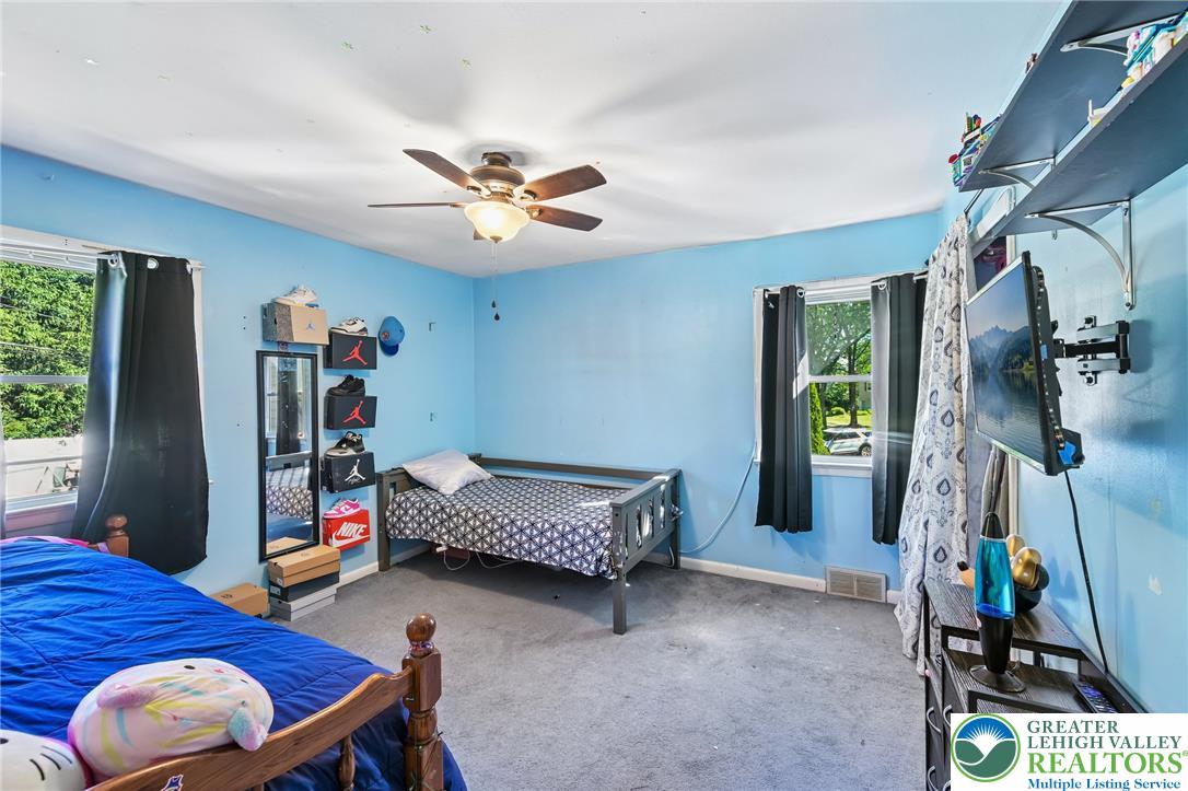 2649 Nottingham Road Bethlehem, PA 18017 - Photo 17 of 49 This spacious bedroom offers ample natural light and a practical layout.