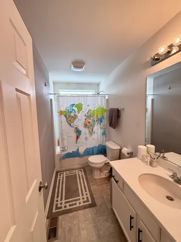 a bathroom with a sink a vanity and a mirror