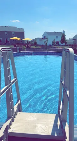 a view of balcony with two chairs
