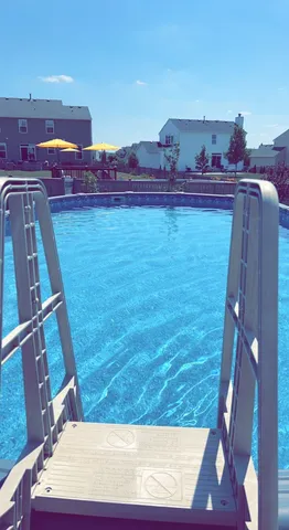 a view of balcony with two chairs