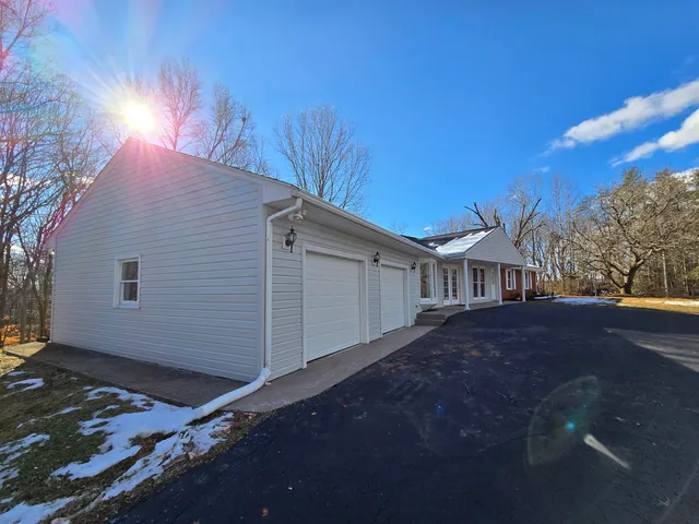 a view of swimming pool with seating area