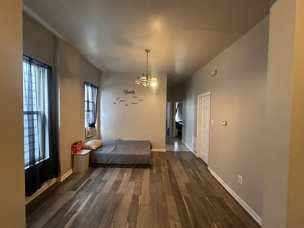 a view of gallery with wooden floor